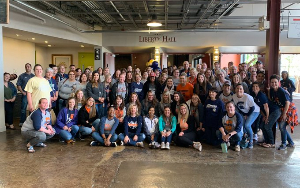   SHS faculty and staff pose for a picture during a community service project